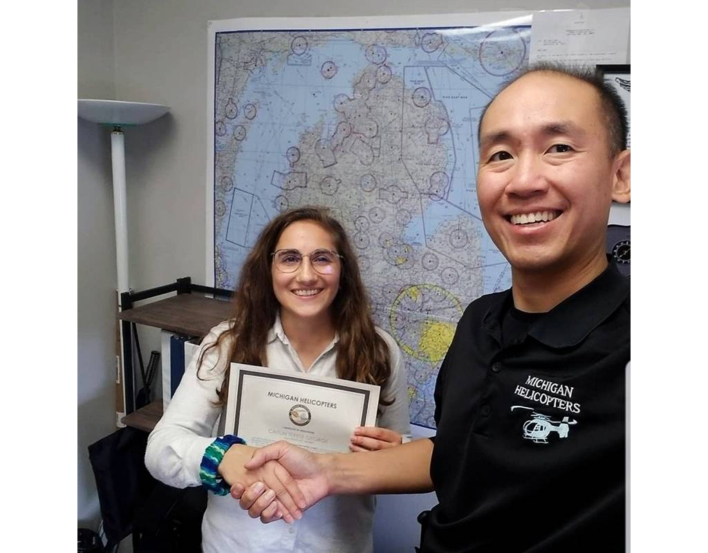 Caitlin George with her instructor, Ben Tong, after passing her check ride. ICARUS Photo