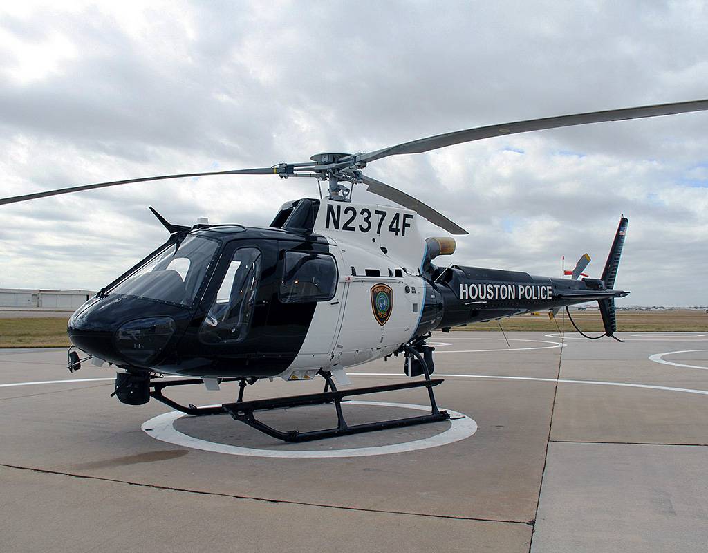 The blue line on the Houston Police Department’s new helicopter is the same color blue that Officer Knox used to restore old police vehicles. Houston Police Department Photo