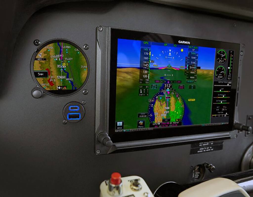 Garmin’s new GSB 15 models include two USB ports that support up to 27W of power output per port simultaneously, allowing pilots and passengers to charge most mobile devices while they are using them. Garmin Photo
