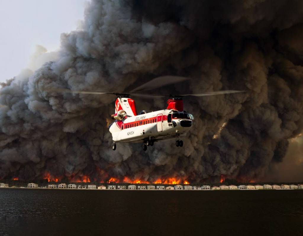 Visibility hazards during a fire, including smoke and haze, limit aircraft operations to an estimated one-third of the available day. Columbia Photo