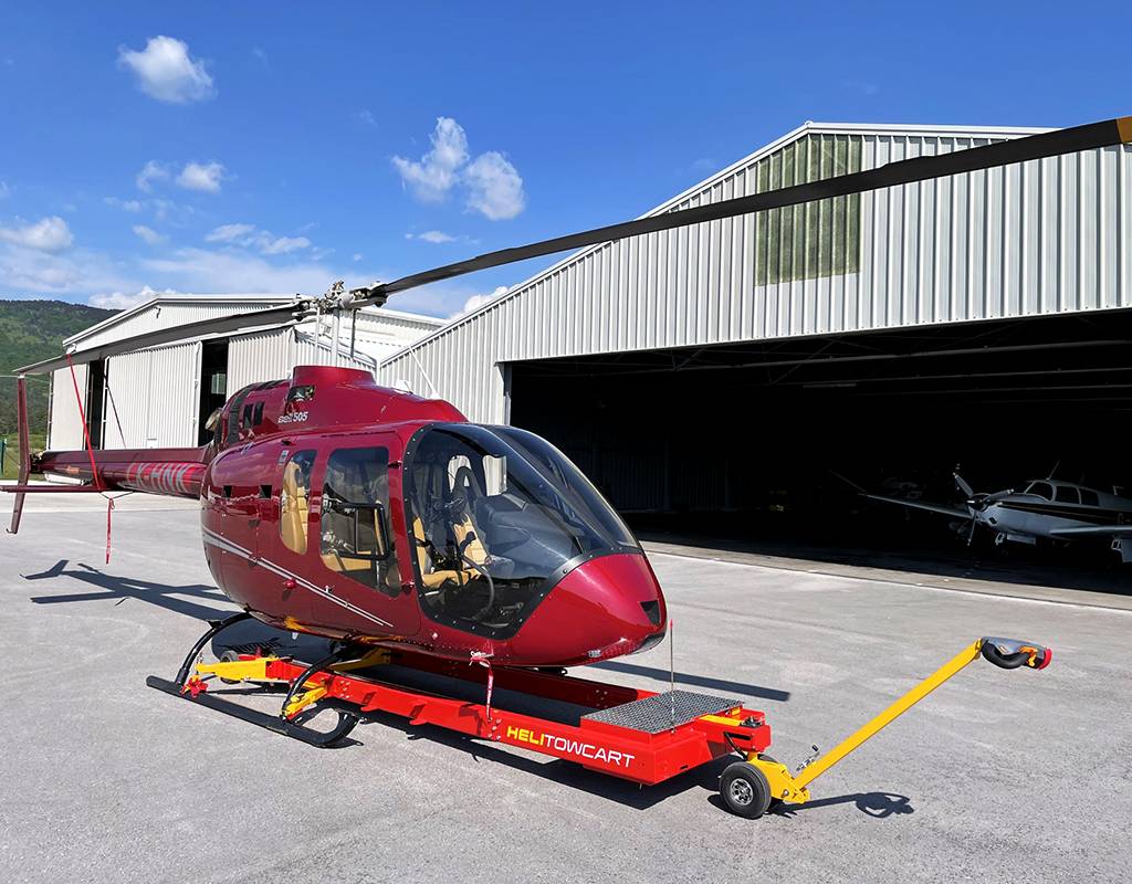Helitow Cart’s narrow-bodied V910 Heli-Carrier offers a solution for private owners and light commercial operators moving the Bell 505 or other aircraft on hard surfaces. HeliTow Cart Photo
