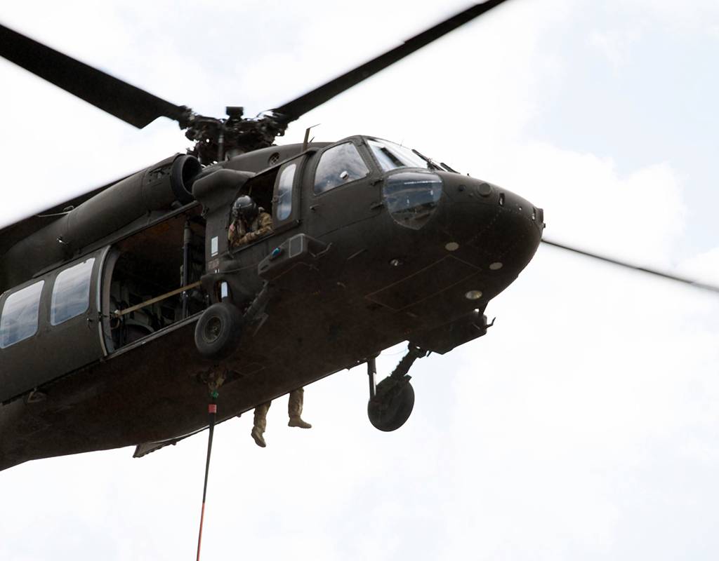 Wisconsin Army National Guard UH-60 Black Hawk crews from the Madison, Wis.-based 1st Battalion, 147th Aviation train to drop water on wildfires using Bambi Buckets at Fort McCoy, Wis., August 12, 2021 in preparation for deployment to California. Greg Mason for U.S. Army Photo