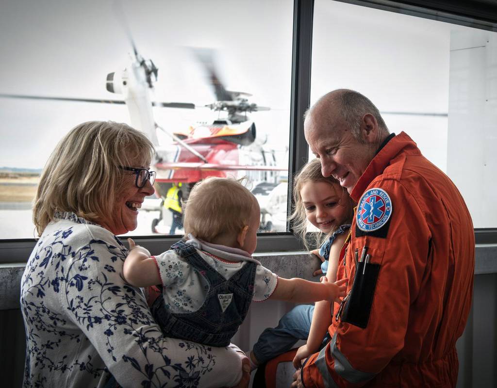 Kevin Weller, chief technical crew at HM Coastguard Search and Rescue base, Caernarfon with his wife and grandchildren at a base family day. Bristow Photo