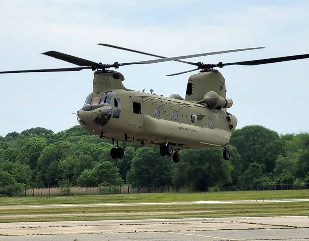 A Ch-47 Chinook helicopter hovers for the first time in two years at the Connecticut National Guard’s 1109th Theater Aviation Support Maintenance Group in Groton, Conn. June 2, 2021. This helicopter was battle damaged after a hard landing while serving in Iraq and had been sitting in Kuwait since 2018 awaiting repairs. Courtesy Photo