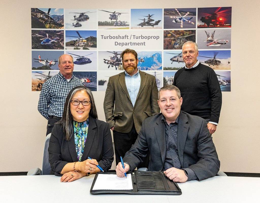 GE and Brightwater United Aero Group representatives sign agreement for the supply of LRUs and consumable spare parts for CT7 and T700 Restricted Category engines. GE Aviation Photo