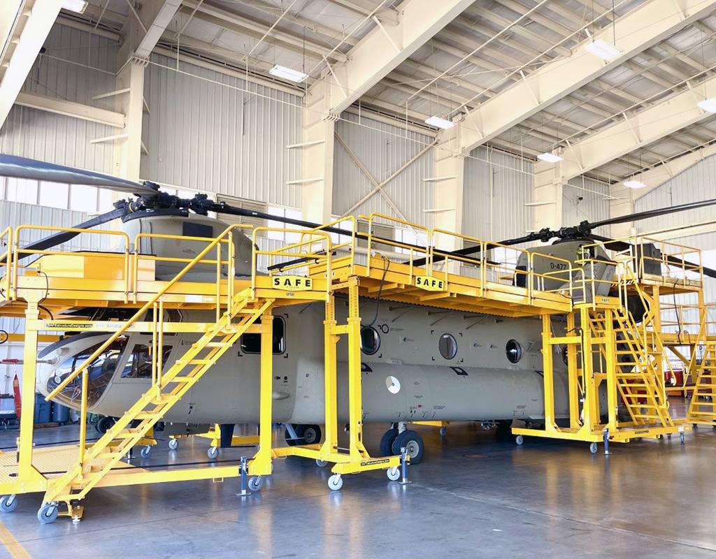 The SAFETY FIRST ergonomic platforms allow technicians SAFE access to all areas of their Boeing CH-47F aircraft fleet. S.A.F.E. Photo