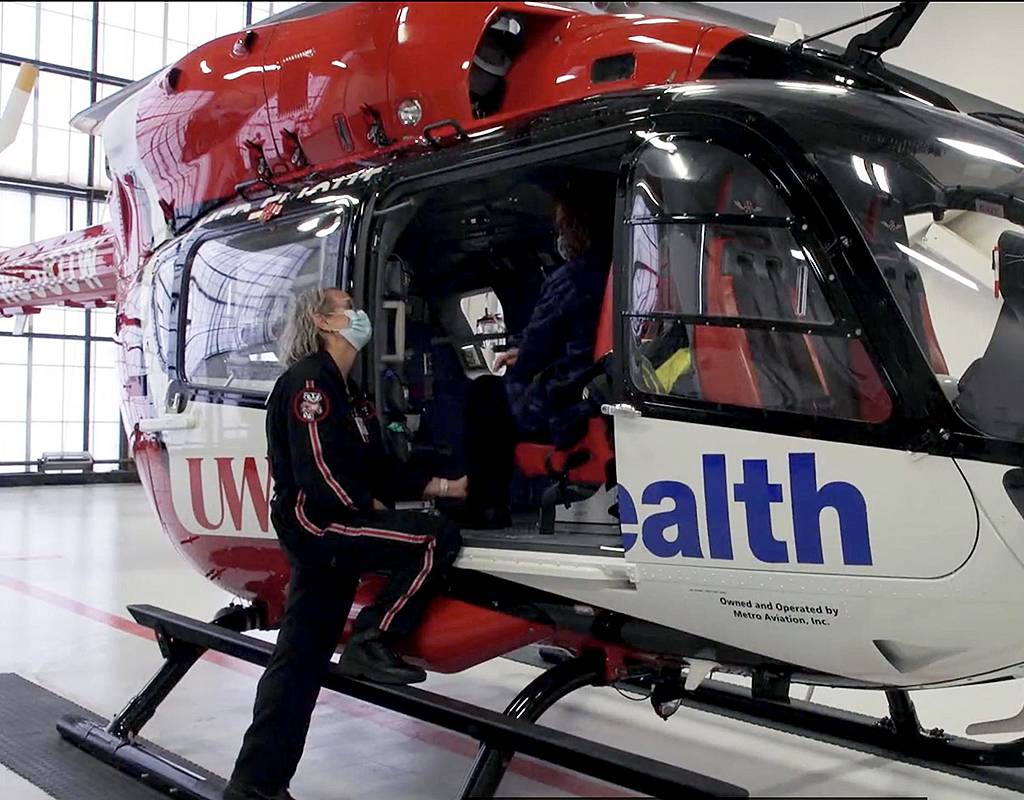 Kerl toured the Med Flight helicopter hangar with the nurse who, according to Kerl, is responsible for her being alive today. UW School of Medicine and Public Health Photo