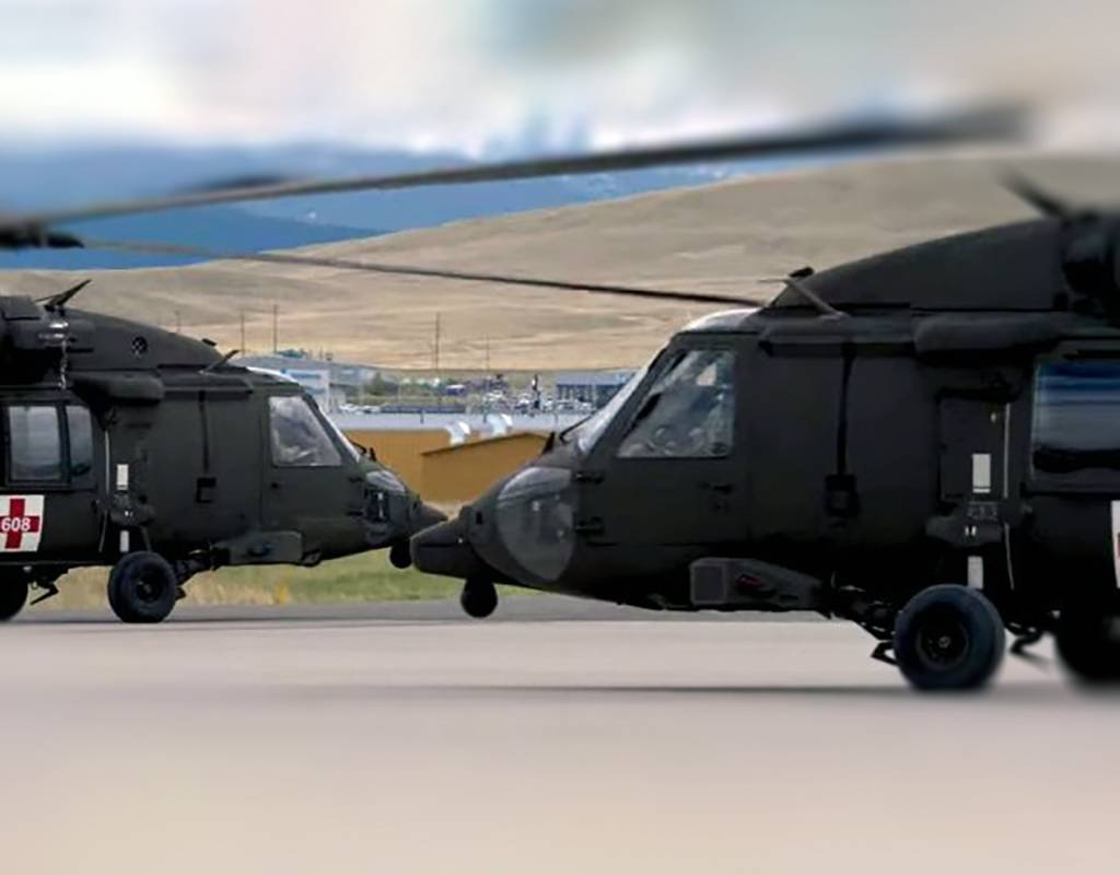 Two HH-60 Black Hawk helicopters faced off in testing of the Rescue System Litter Attachment’s capabilities at Montana Army National Guard base in Helena, Montana. Vita Inclinata Image