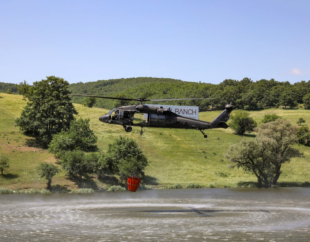 U.S. Army Soldiers assigned to 2nd Battalion, 224th Aviation Regiment, 29th Combat Aviation Brigade, 29th Infantry Division, Virginia National Guard, conduct Bambi bucket aerial firefighting training near Gjilan, Kosovo, June 2, 2022. Staff Sgt. Amouris Coss for U.S. Army Photo