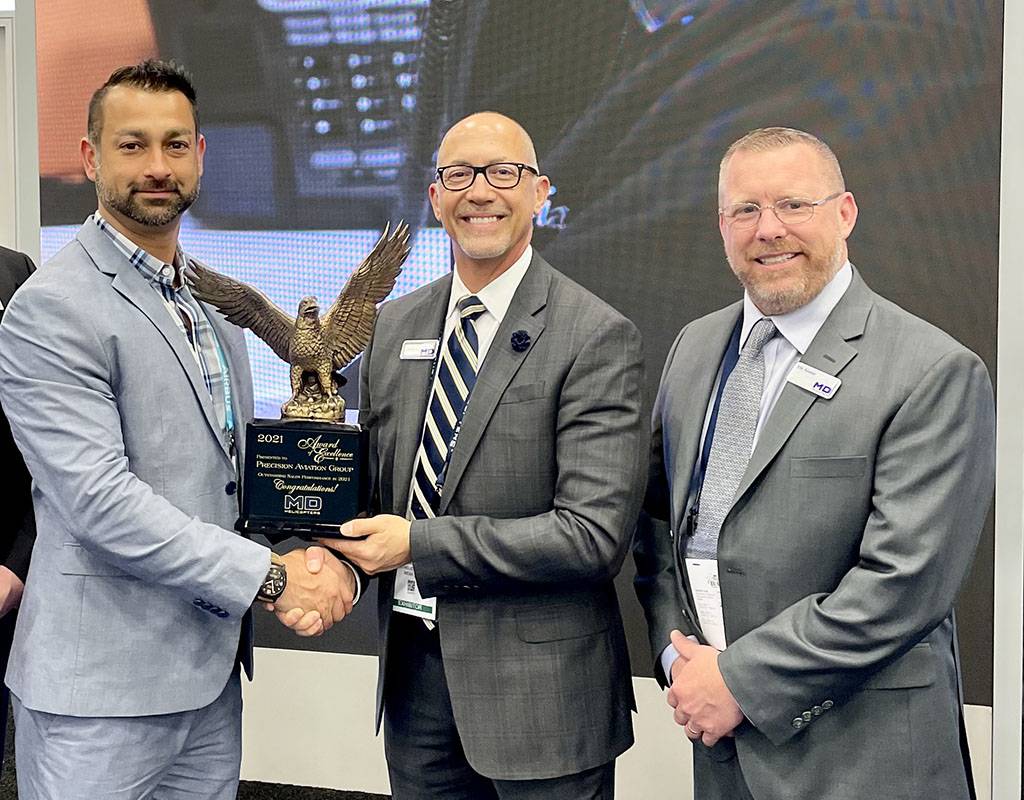 Ketan Desai, PAG chief sales and marketing officer; Nick Nenadovic, vice president, aftermarket and customer support at MD Helicopters; and Eric Kessler, director, customer service.