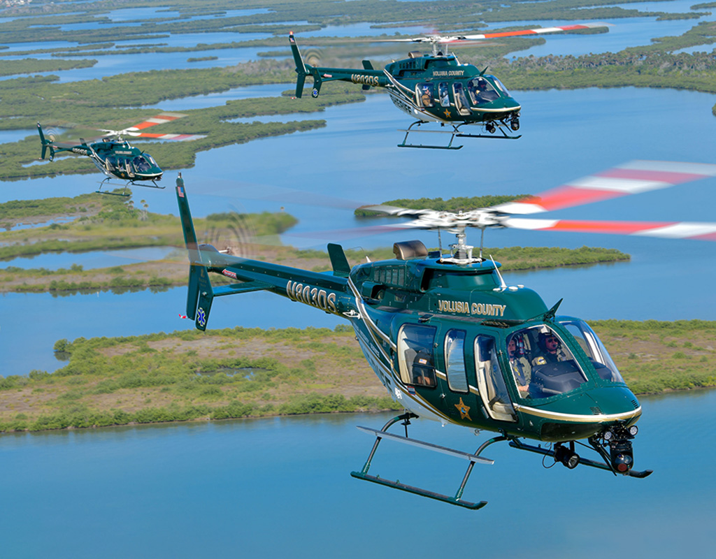 A three-ship of Bell 407s belonging to Volusia County Sheriff’s Aviation Unit on a local area training flight. Photo Mike Reyno