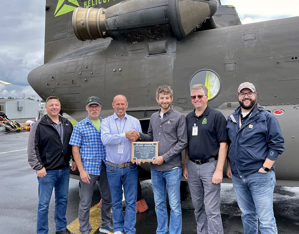 ROTAK Helicopter Services accepts delivery of two CH-47D Chinook Helicopters from Columbia Helicopters. Featured left to right: Bob Buchanan, Columbia Helicopters, VP of maintenance services; Kevin Greenfield, ROTAK, partner; Steve Bandy, Columbia Helicopters, president and CEO; Ely Woods, ROTAK, founder and general manager; Martin Cude, ROTAK, director of sales & marketing and Rob Roedts, Columbia Helicopters, VP of aircraft solutions. Columbia Photo