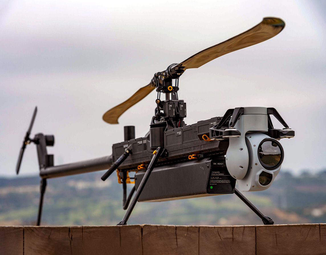 The front end of the Ghost features the Trillium EO/IR turret, and the top rail shows the modular payloads. Just behind the camera is the AI core, Lattice. Beneath the drone is the large battery pack. All components are completely waterproof. Dan Megna Photo