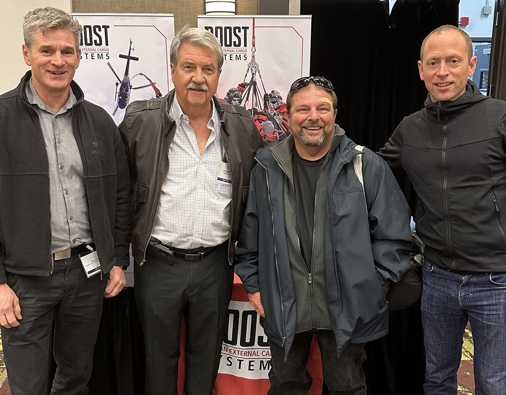 From left to right, Derek Thomas, president at Boost; Rod Anderson, director of operations at HeliStream; Kelly Liken, utility manager at HeliStream and Jeff Yarnold, VP of operations at Boost. Boost Photo