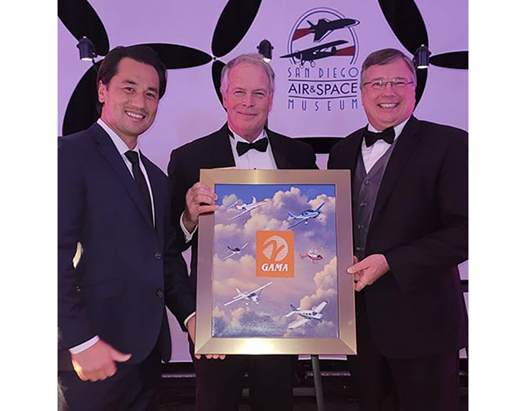 GAMA’s David Dunning, director of global innovation and policy; Pete Bunce president and CEO and Walter Desrosier, vice president of engineering and maintenance, at the International Air & Space Hall of Fame celebration. GAMA Photo