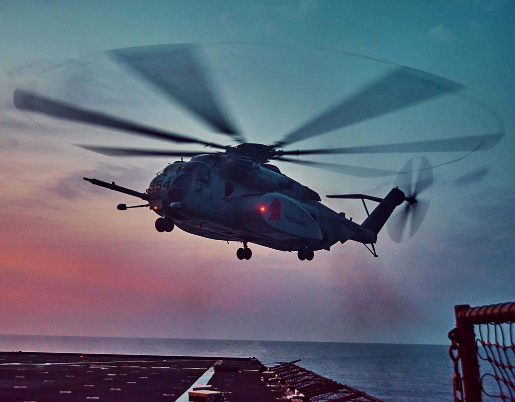 A Sikorsky MH-53 Sea Dragon, attached to Helicopter Mine Countermeasures Squadron 14 (HM-14) Detachment 2A, approaches the Flight Deck of amphibious dock landing ship USS Germantown Lt. j.g. Yeltsin E. Rodriguez Photo