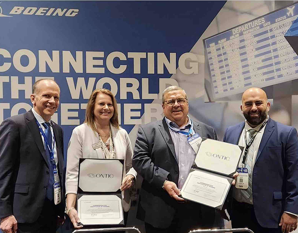 Boeing signs exclusive distributor agreement with Ontic at MRO Americas in Atlanta, Georgia. Pictured from left to right: Scott Sloane, Boeing; Sheena Mitchell, Boeing; Chris Muklevicz, Ontic; and Jack Karapetyan, Ontic. Ontic Photo