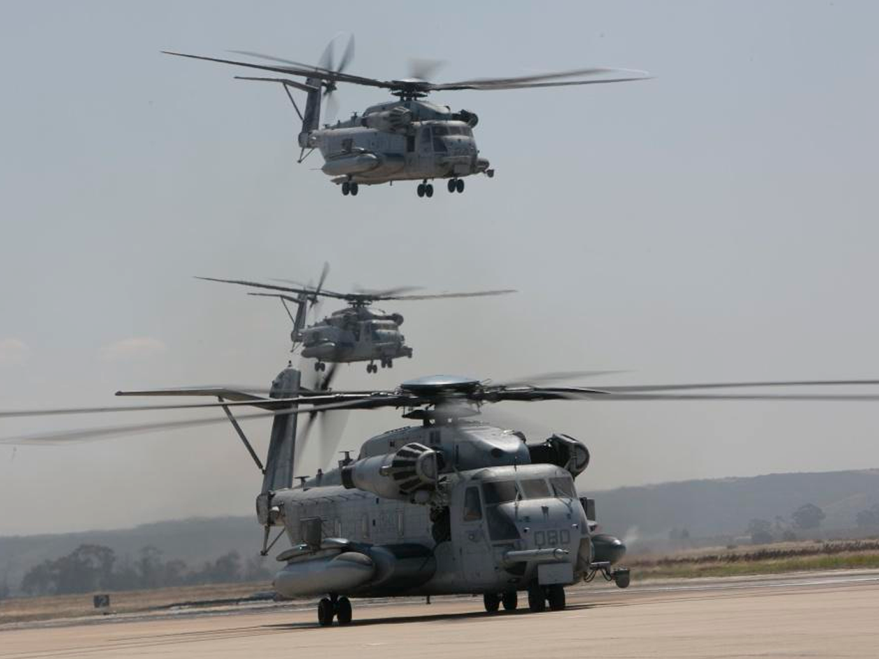 U.S. Marine Corps CH-53E Super Stallions with Marine Heavy Helicopter Squadrons (HMH) 361, 465 and 466, Marine Aircraft Group (MAG) 16, 3rd Marine Aircraft Wing (MAW), take off from the flight line during a mass flight exercise at Marine Corps Air Station Miramar, California, June 6, 2019. LCpl Julian Elliott-Drouin Photo