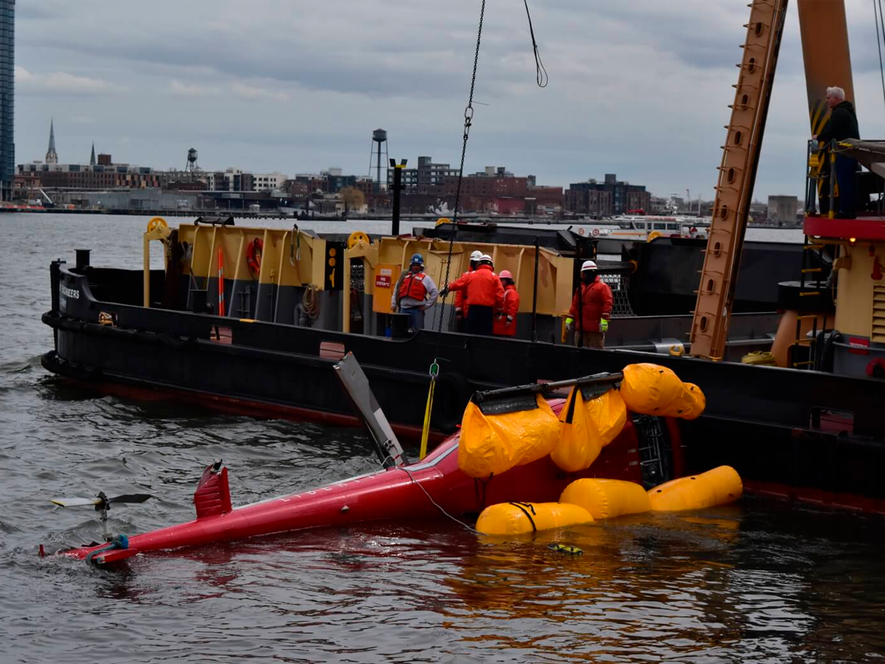 The OIG’s audit stems from a March 2018 accident in which five tightly harnessed passengers drowned after their helicopter made an emergency landing to New York City’s East River. NTSB Photo