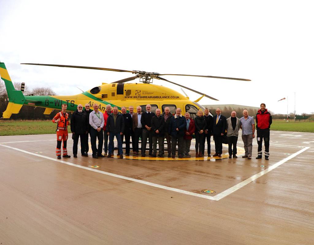 Former Air Support Unit crew stand by Wiltshire Air Ambulance’s Bell 429 helicopter with current paramedic Craig Wilkins (far left), pilot Rob Collingwood (far right) and Kevin Reed, head of facilities and security (fourth from left). Wiltshire Air Ambulance Photo