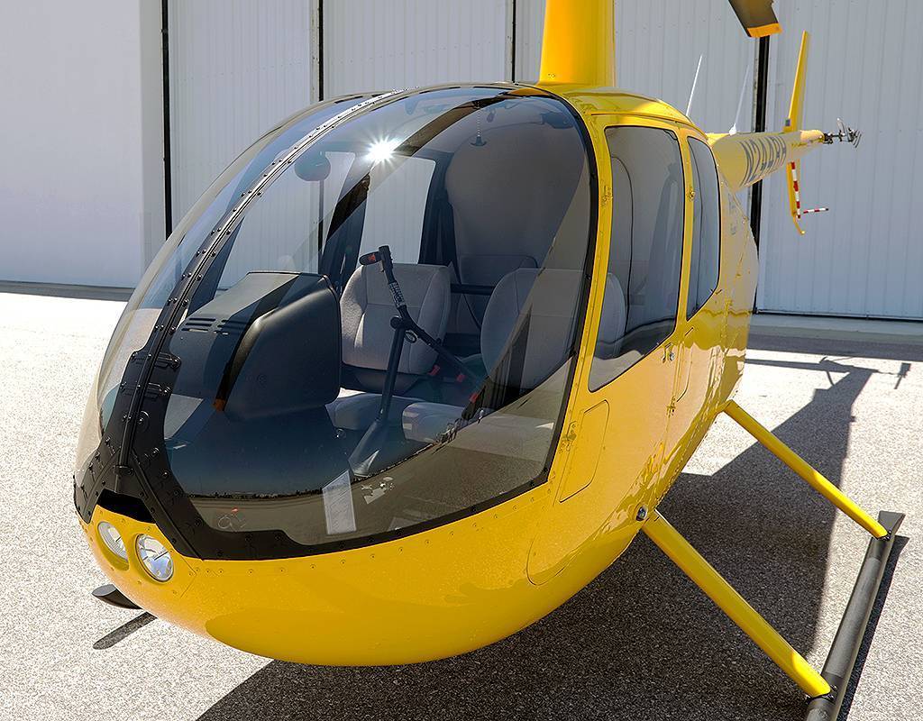 The new windshields are constructed of tough, energy-absorbing polycarbonate (standard windshields are made of acrylic) and installed with distinctive retention hardware. Robinson Photo