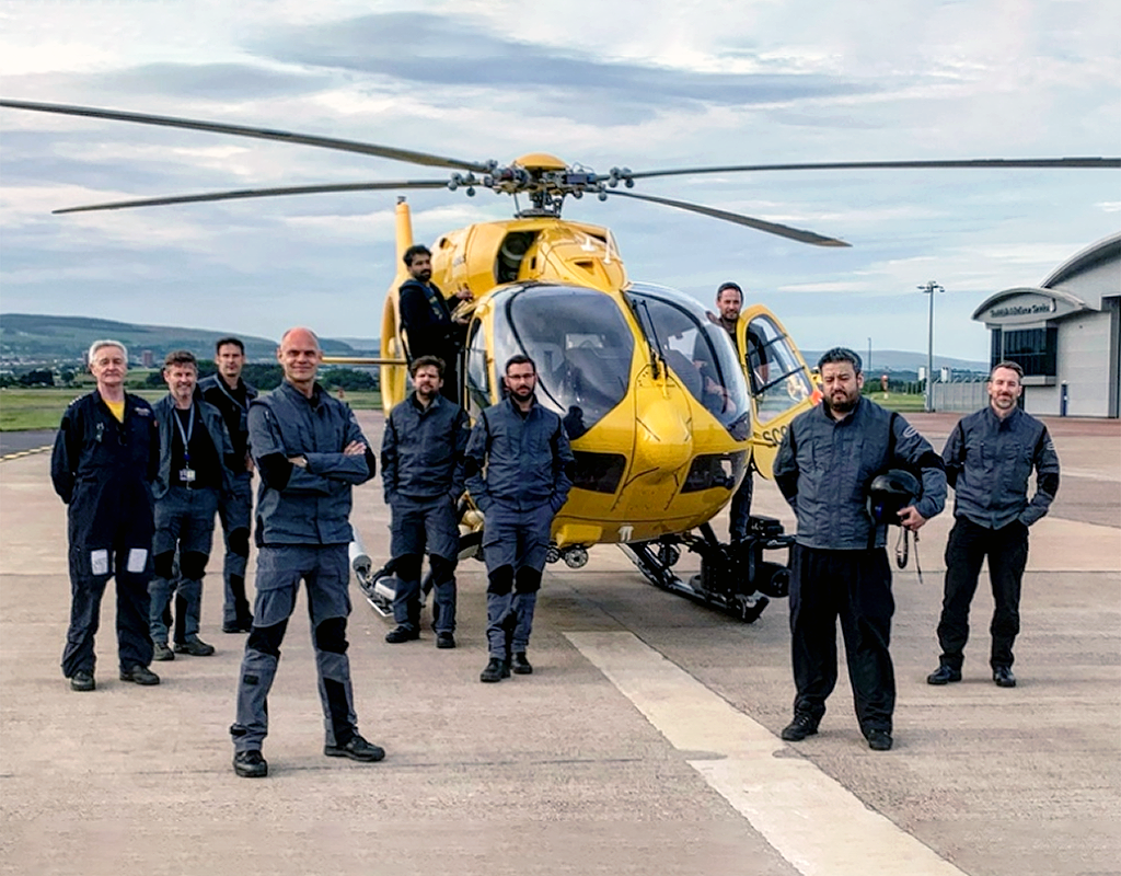Gama Aviation has taken over all SAS’s HEMS missions. Captain Andy Lister, head of  flight operations, Scotland (fourth from the left) is pictured with some of his team.