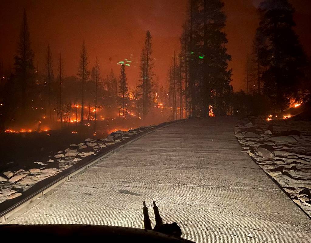 The view from the cockpit during the Creek Fire rescues at Mammoth Pool Reservoir. According to pilot CW5 Joe Rosamond, the crew’s night vision goggles “performed beautifully, with only the largest hot spots shutting them down momentarily.” California National Guard Photo