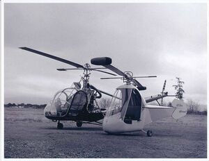 The small Hiller Hornet (right) sits next to a Hiller Model 360 helicopter. Jeff Evans Collection Photo