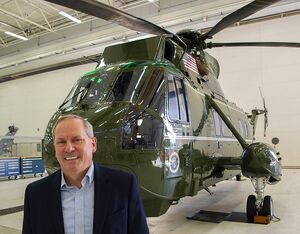 Glenn Perryman, deputy program executive officer for Air Anti-Submarine Warfare, Assault, and Special Mission Programs, stands in front of Sikorsky NVH-3A Sea King BuNo 150614, which his father flew as commanding officer of Marine Helicopter Squadron (HMX) 1. The helicopter subsequently served Air Test and Evaluation Squadron (HX) 21 as a testbed for 32 years before making its last flight in October 2020. NAVAIR Photo