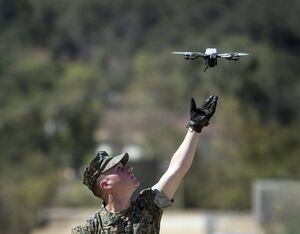 U.S. Marine Corps Cpl. Josiah Rodriguez, with 1st Battalion, 5th Marine Regiment, 1st Marine Division, prepares to catch a quadcopter during Small Unmanned Aircraft System (SUAS) training on Marine Corps Base Camp Pendleton Sept. 19, 2018. This training certified the Marines to be SUAS operators. This increases the Marines’ situational awareness and enhances their ability to plan and adapt during missions.