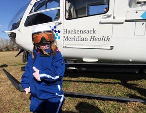 Sophia Colavito, 4, became an honorary member of the Hackensack Meridian Hackensack University Medical Center’s AirMed flight crew during a special fly-in event at South Toms River Elementary School Field Hackensack Meridian Health Photo