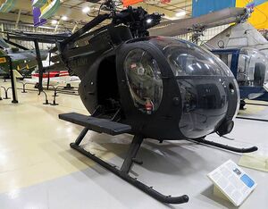 Kurt Muse will speak adjacent AHMEC’s Hughes MH-6J helicopter, which was recreated from parts of the “Little Bird” that rescued him. American Helicopter Museum Photo