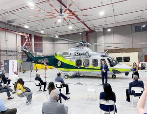 Officials from the Miami-Dade County government, including Mayor Carlos A. Giménez, spoke at the handoff of the first of four AW139 aircraft to Miami-Dade Fire and Rescue on Oct. 13. Leonardo Photo
