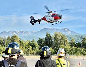 An Airlift Northwest helicopter lands during a training activity. Jay Cline for UW Medicine Photo