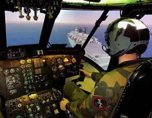 A member of the Royal Norwegian Air Force (RNoAF) completes training in a HeliOperations simulator. HeliOperations Photo