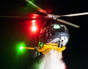 Talon Helicopters Airbus AS365N2 night flying water drop excercise near Pitt River, BC. Heath Moffatt Photo