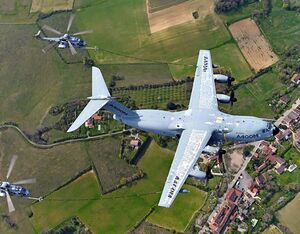 The A400M performs simultaneous refueling operations of two French Air Force H225M helicopters. Airbus Photo