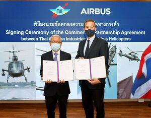 Air Chief Marshal Supachai Saingurn, managing director of Thai Aviation Industries (left) and Pierre Andre, managing director, Airbus Helicopters Thailand. Airbus Photo