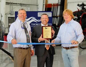 MD Helicopters celebrates with Thoroughbred Aviation on the expansion of their Authorized Service Center at the Blue Grass Airport. From left: Todd Case, Thoroughbred Aviation; Eric Kessler, MD Helicopters; Joe Otte, Thoroughbred Aviation. MDHI Photo