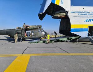 Puma helicopter being loaded off an Antonov aircraft at RAF Benson. Ministry of Defence Photo