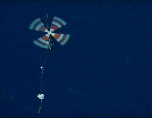 An Electron booster being flown under a Bell 429 after a previous Rocket Lab launch. YouTube Screenshot