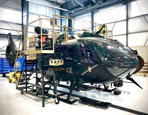 The maintenance stands are painted black and gold to match the color scheme of the New Mexico State Police. S.A.F.E. Photo