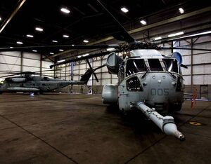 A CH-53K King Stallion (right) and a CH-53E Super Stallion are staged during a redesignation ceremony at Marine Corps Air Station New River, North Carolina, Jan. 24, 2022. Lance Cpl. Elias E. Pimentel III for U.S. Marine Corps Photo