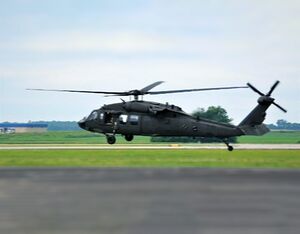 A UH-60V Black Hawk departs for a record test flight during the initial operational test & evaluation (IOT&E) at Ft. McCoy, WI. Paul Stevenson Photo