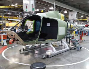 A 505 Jet Ranger X makes its way along the final assembly line in Mirabel, Quebec. Bell Photo