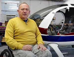 Captain (Ret) Stewart McQuillan is the first paraplegic to fly a helicopter and the first to build one. NV3 Foundation Photo