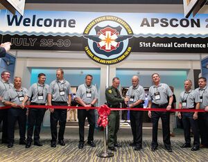Washoe County Sheriff Darin Balaam is joined by members of the APSA board of directors in cutting the ribbon at APSCON 2022. Brent Bundy Photo