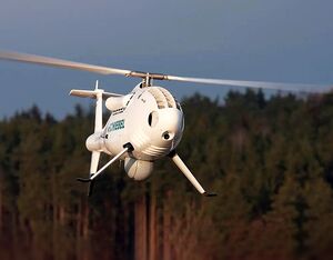 The Camcopter S-100 Vertical Takeoff and Landing (VTOL) UAS operates day and night, under adverse weather conditions with a range of payloads, out to 200 km, both on land and at sea. Schiebel Photo
