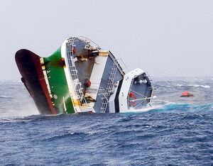 The bow of the doomed Atlantic Destiny fishing vessel points skyward as the ship sinks into the Atlantic Ocean.