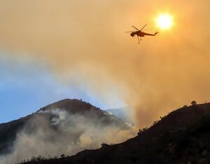Erickson move its Air Cranes around the world, following the fires in an endless summer. Greg Doyle Photo